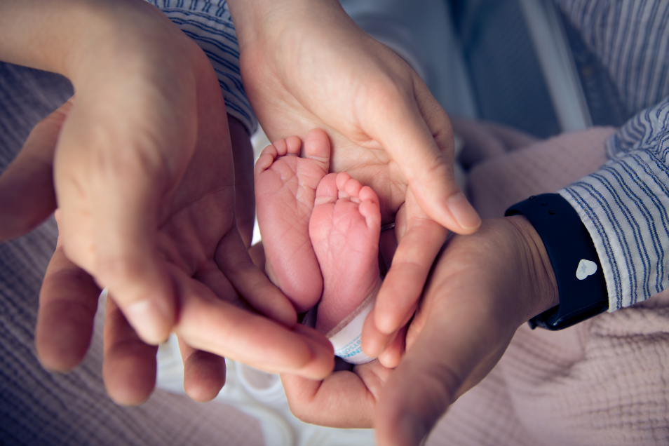 Parents Hold Babys Feet