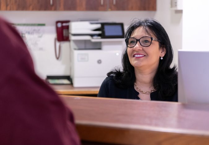 675 X470 Lindo Wing Receptionist With Patient