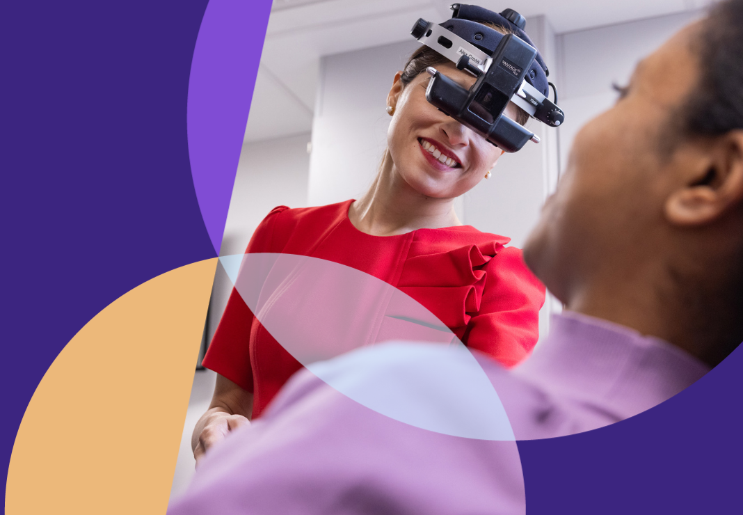 Ophthalmologist With Patient Examining Their Eyes